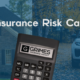 Title image with overlay text "how is insurance risk calculated?", on top of a faded background image of a home and vehicle. A graphic of a calculator is placed in the bottom middle of the image with the Grimes logo on its screen.